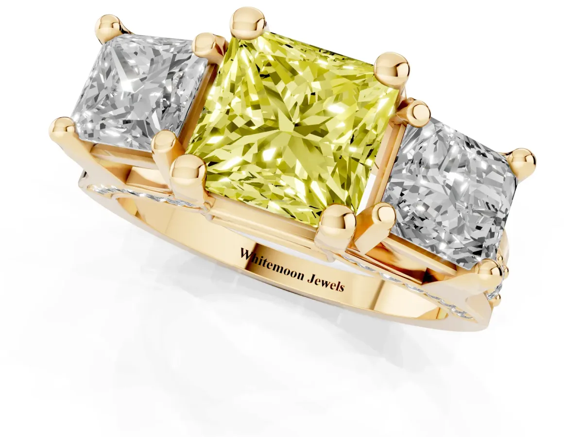 Fancy Yellow Princess Cut Diamond Three-Stone Ring with Channel Set Band and Four-Prong Setting Yellow gold