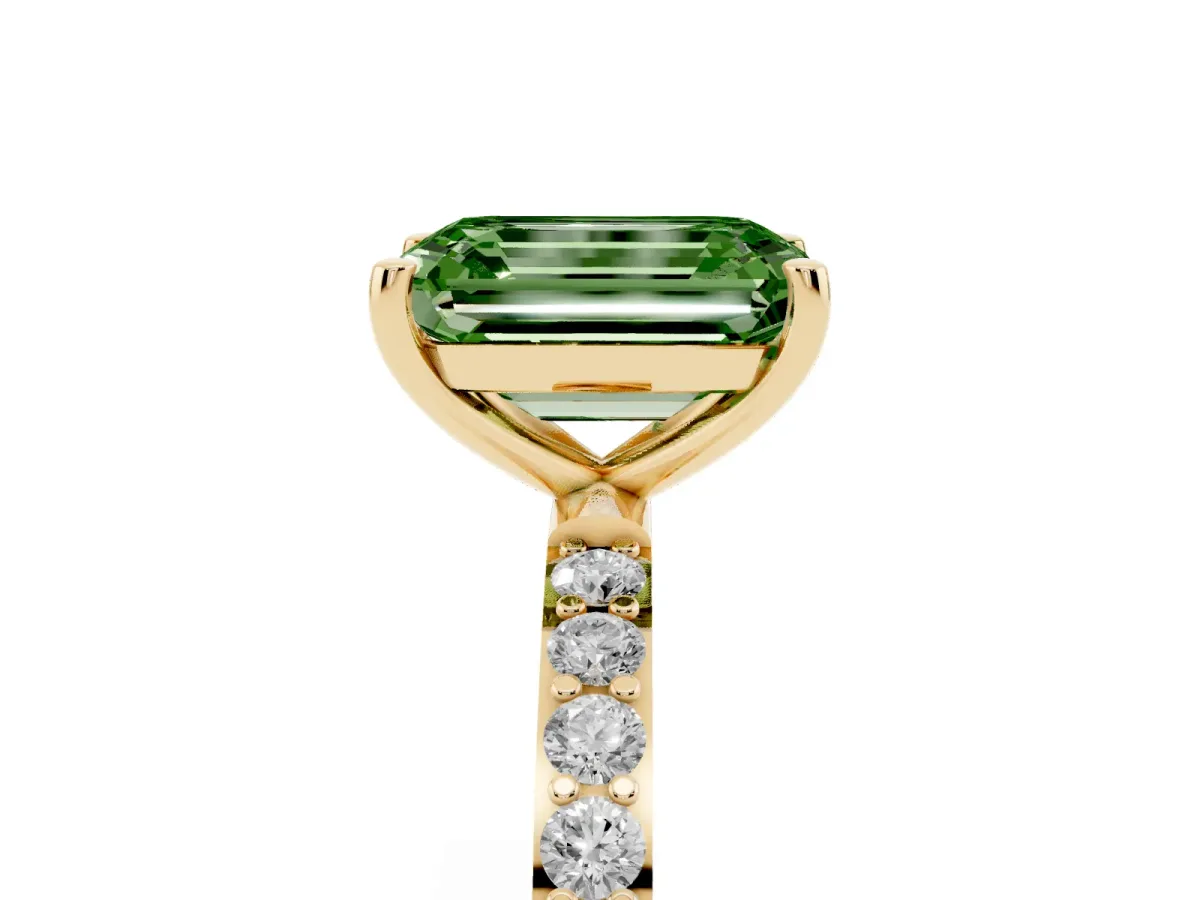 Fancy Green Emerald Cut Diamond Solitaire Ring with Round Pavé Shoulders and Prong Setting Yellow gold