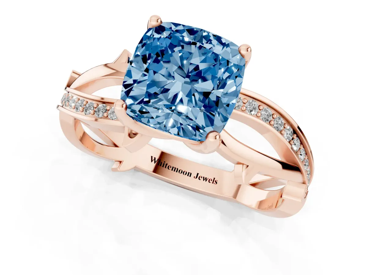 Fancy Blue Cushion Cut Solitaire Twist Band with Pavé Accents and Four-Prong Setting Rose gold