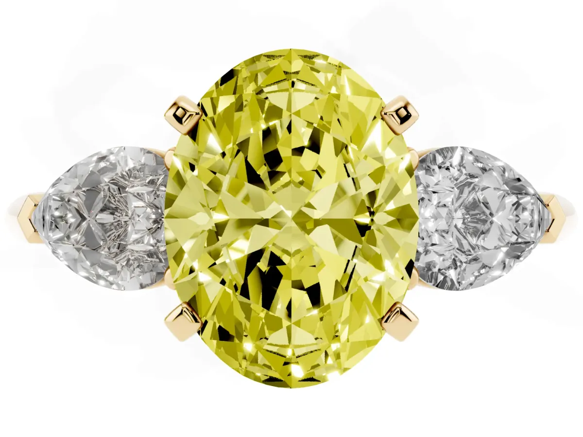 Fancy Yellow Three-Stone Oval Cut Diamond Ring with Pear Side Stones and Four-Prong Setting Yellow gold
