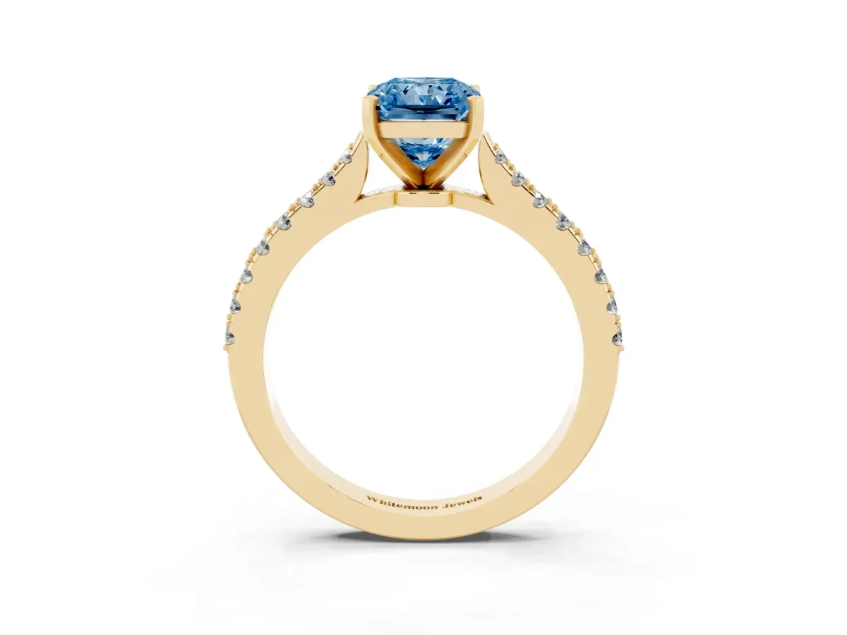 Fancy Blue Radiant Cut Cut Solitaire Diamond Engagement Ring with Pave Band and Four-Prong Setting Yellow gold