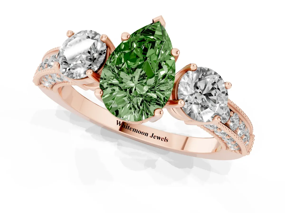 Fancy Green Pear Cut Three-Stone Diamond Ring with Pavé Band and Four-Prong Setting Rose gold