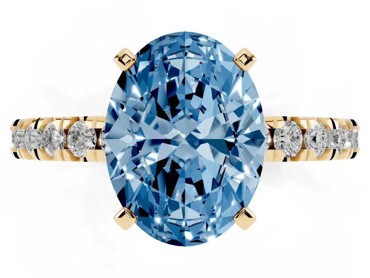 Fancy Blue Oval Cut Diamond Pavé Band Solitaire with Four-Prong Setting Yellow gold