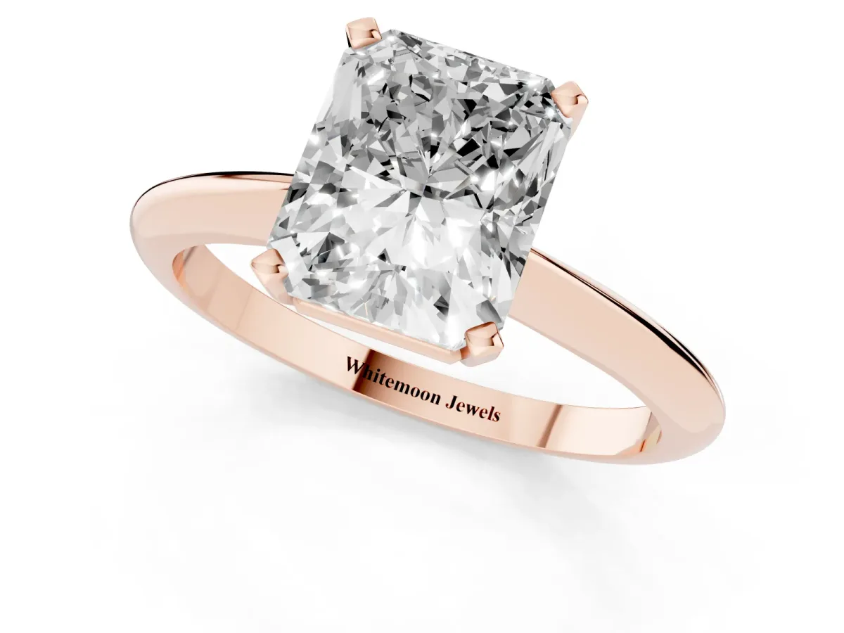 Radiant Cut Cut Solitaire Ring with Four-Prong Setting on a Classic Band Rose gold