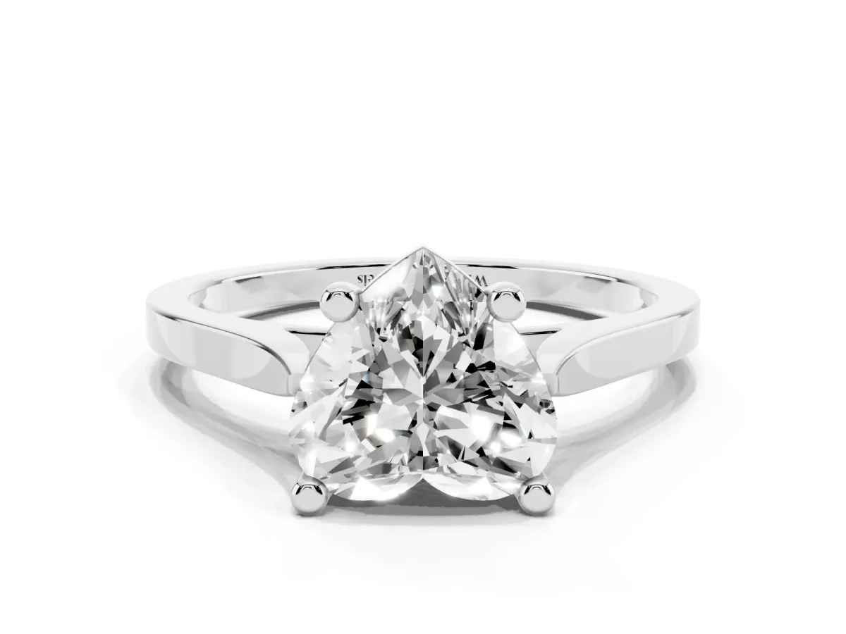 Heart Cut Solitaire Diamond Ring with Four-Prong Setting and Tapered Band Silver