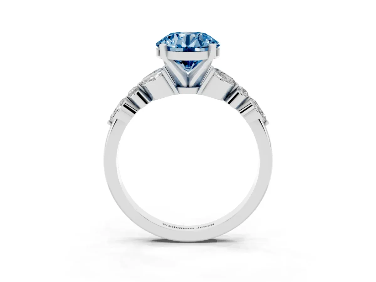 Fancy Blue Round Cut Diamond Solitaire Ring with Side Stones and Four-Prong Setting White gold