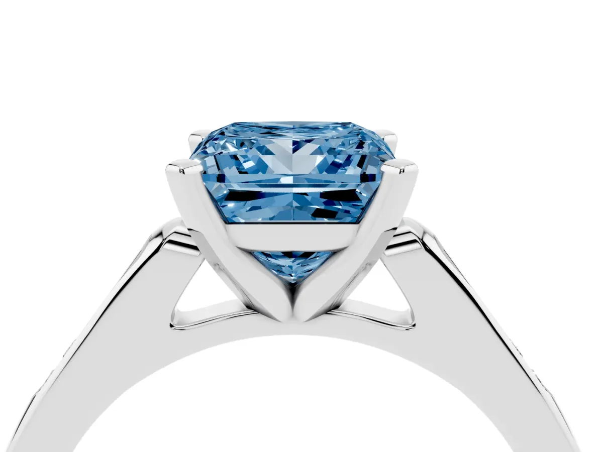 Fancy Blue Princess Cut Diamond Solitaire Ring with Channel Set Round Band and Prong Setting Silver