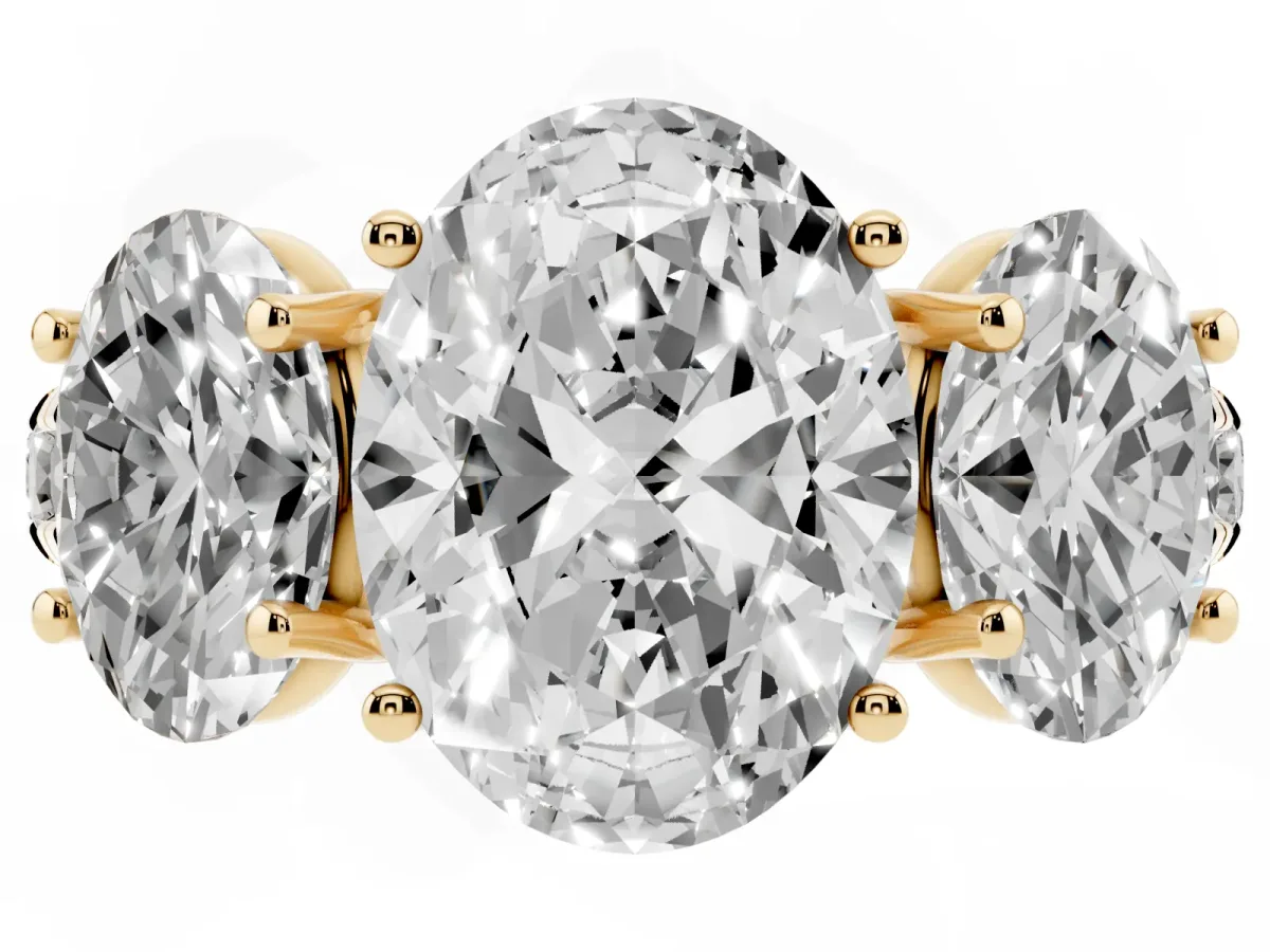 Three-Stone Oval Cut Diamond Pavé Band with Prong Setting Yellow gold