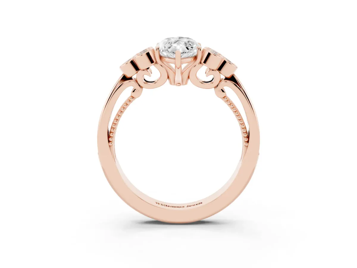 Marquise Cut Cut Diamond Engagement Ring with Bezel Set Round Side Stones and Prong Setting Rose gold