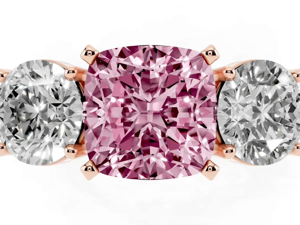 Fancy Pink Three-Stone Cushion Cut Diamond Ring with Round Side Stones, Classic Band, and Four-Prong Setting Rose gold