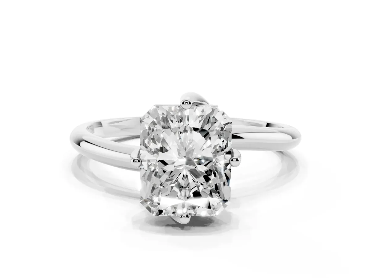Radiant Cut Diamond Solitaire Engagement Ring with Four-Prong Setting and Classic Band Silver