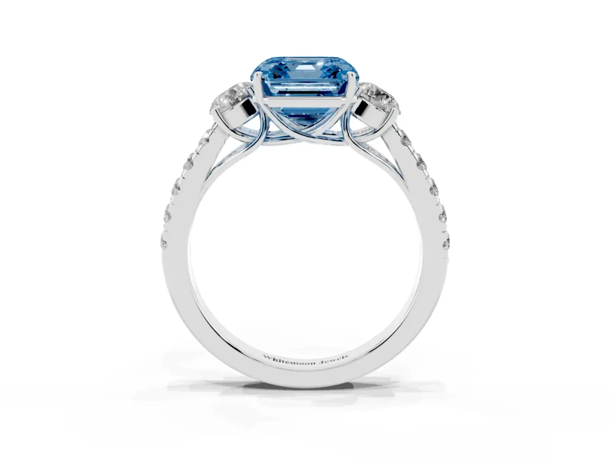 Fancy Blue Asscher Cut Cut Diamond Three-Stone Ring with Round Side Stones and Pavé Band White gold