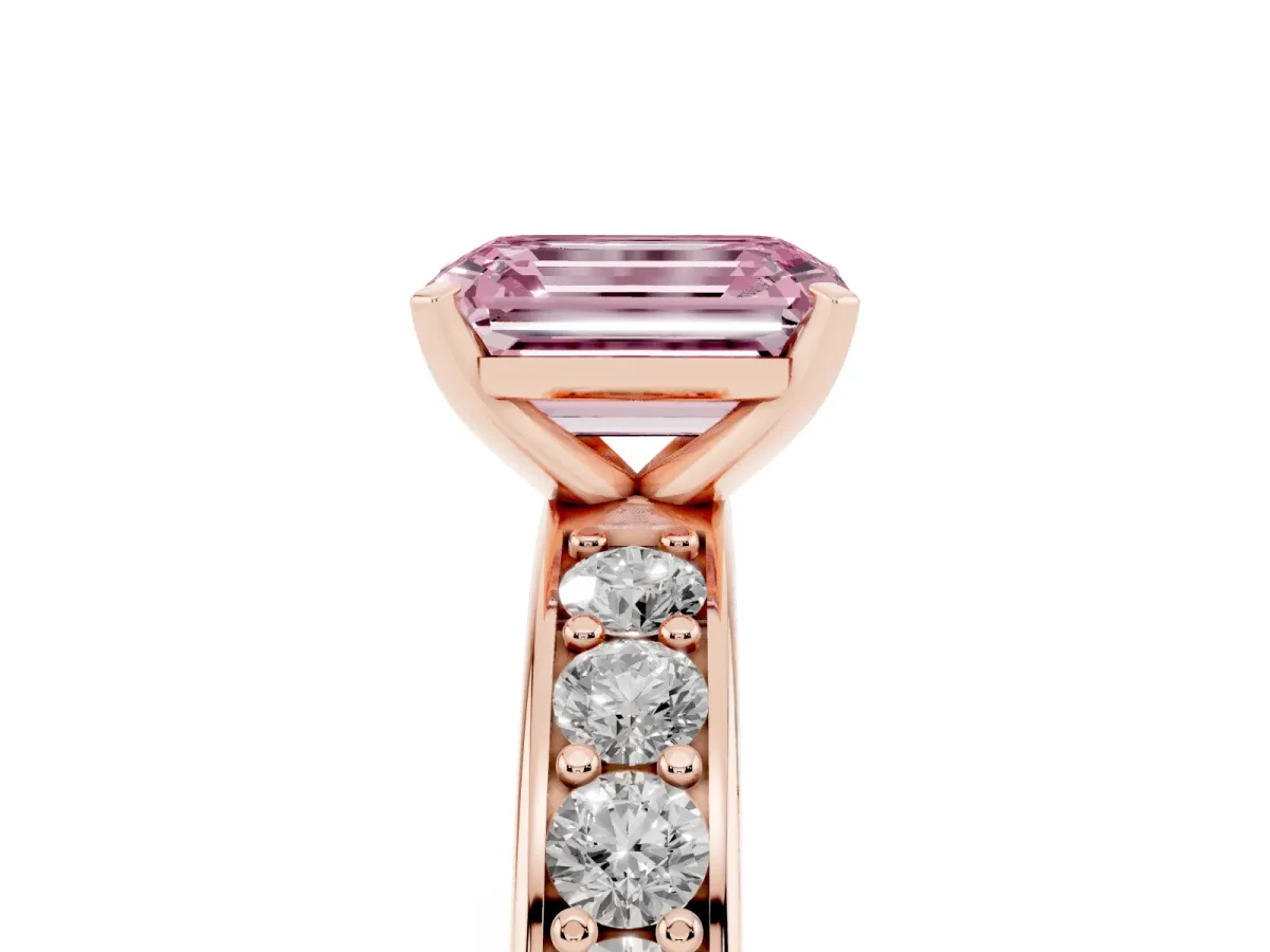 Fancy Pink Emerald Cut Diamond Engagement Ring with Channel Set Round Band and Prong Setting Rose gold