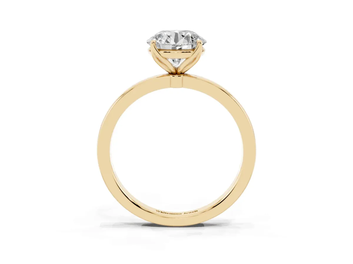 Round Cut Diamond Solitaire Ring with Thin Band and Prong Setting Yellow gold