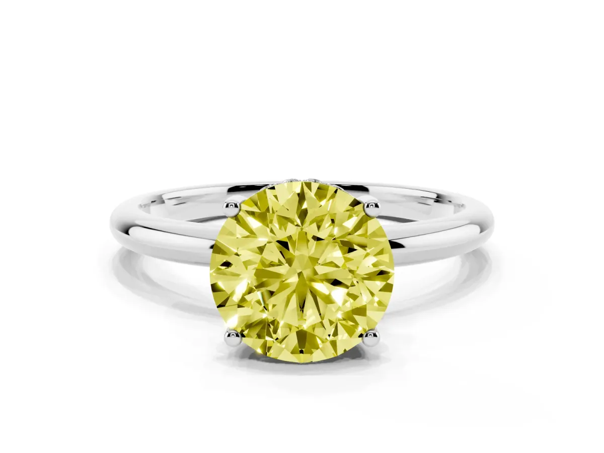 Fancy Yellow Round Cut Cut Solitaire Engagement Ring with Four-Prong Setting and Classic Band Silver