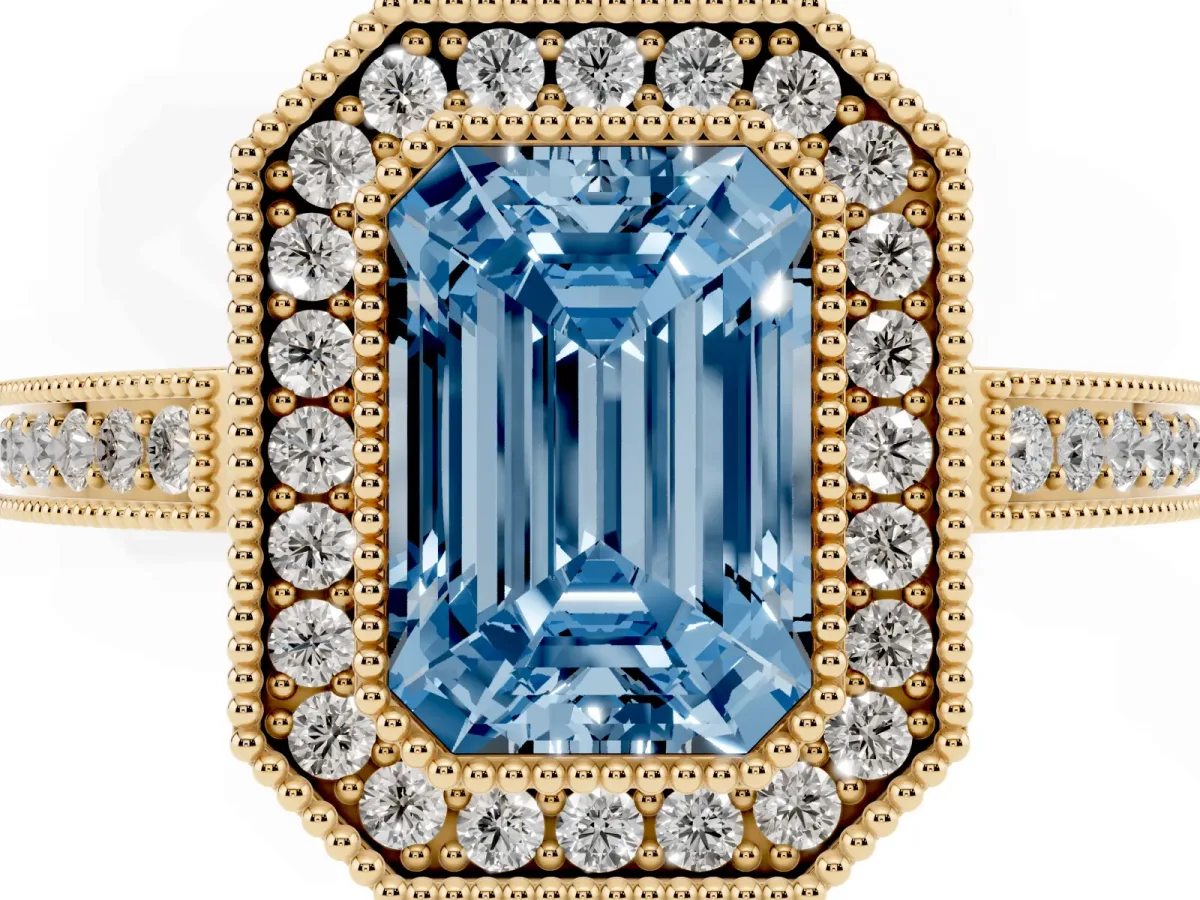 Fancy Blue Emerald Cut Cut Halo Diamond Ring with Pavé Band and Milgrain Prong Setting Yellow gold