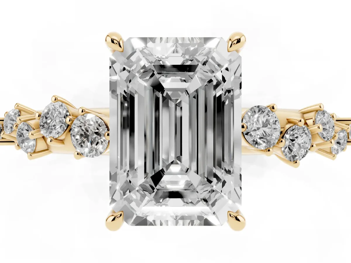 Emerald Cut Diamond Cluster Side Stone Solitaire Ring with Prong Setting Yellow gold
