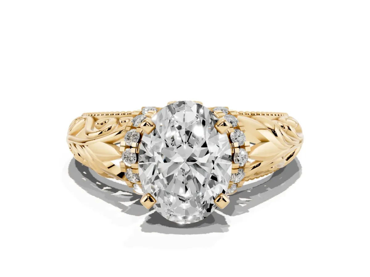 Oval Cut Solitaire Filigree Engagement Ring with Halo and Prong Setting Yellow gold