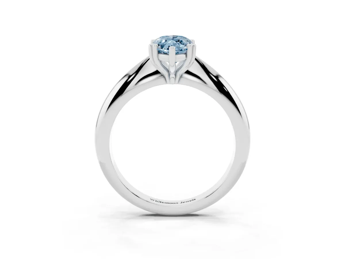 Fancy Blue Marquise Cut Cut Solitaire Engagement Ring with Tapered Band and Four-Prong Setting Silver