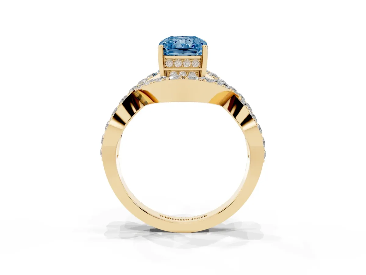 Fancy Blue Radiant Cut Solitaire Twist Band Pavé Diamond Engagement Ring Yellow gold