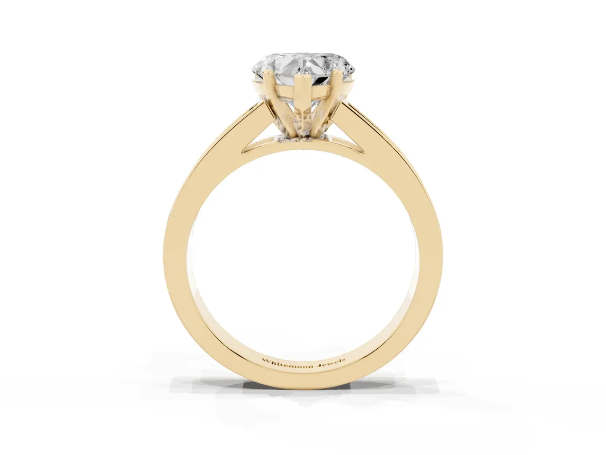 Heart Cut Solitaire Diamond Ring with Channel-Set Band and Four-Prong Setting Yellow gold