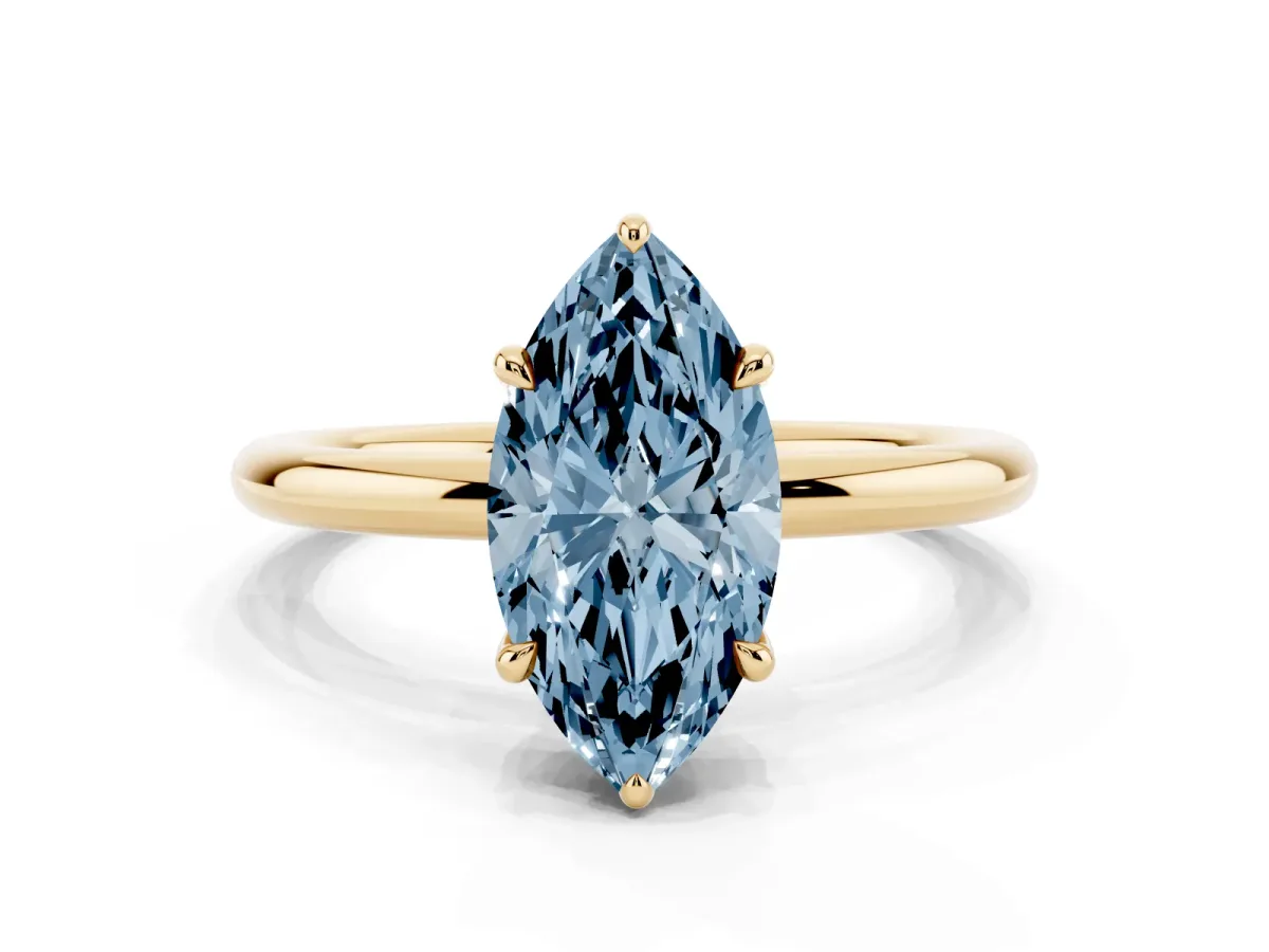 Fancy Blue Marquise Cut Diamond Solitaire Ring with Thin Band and Four-Prong Setting Yellow gold