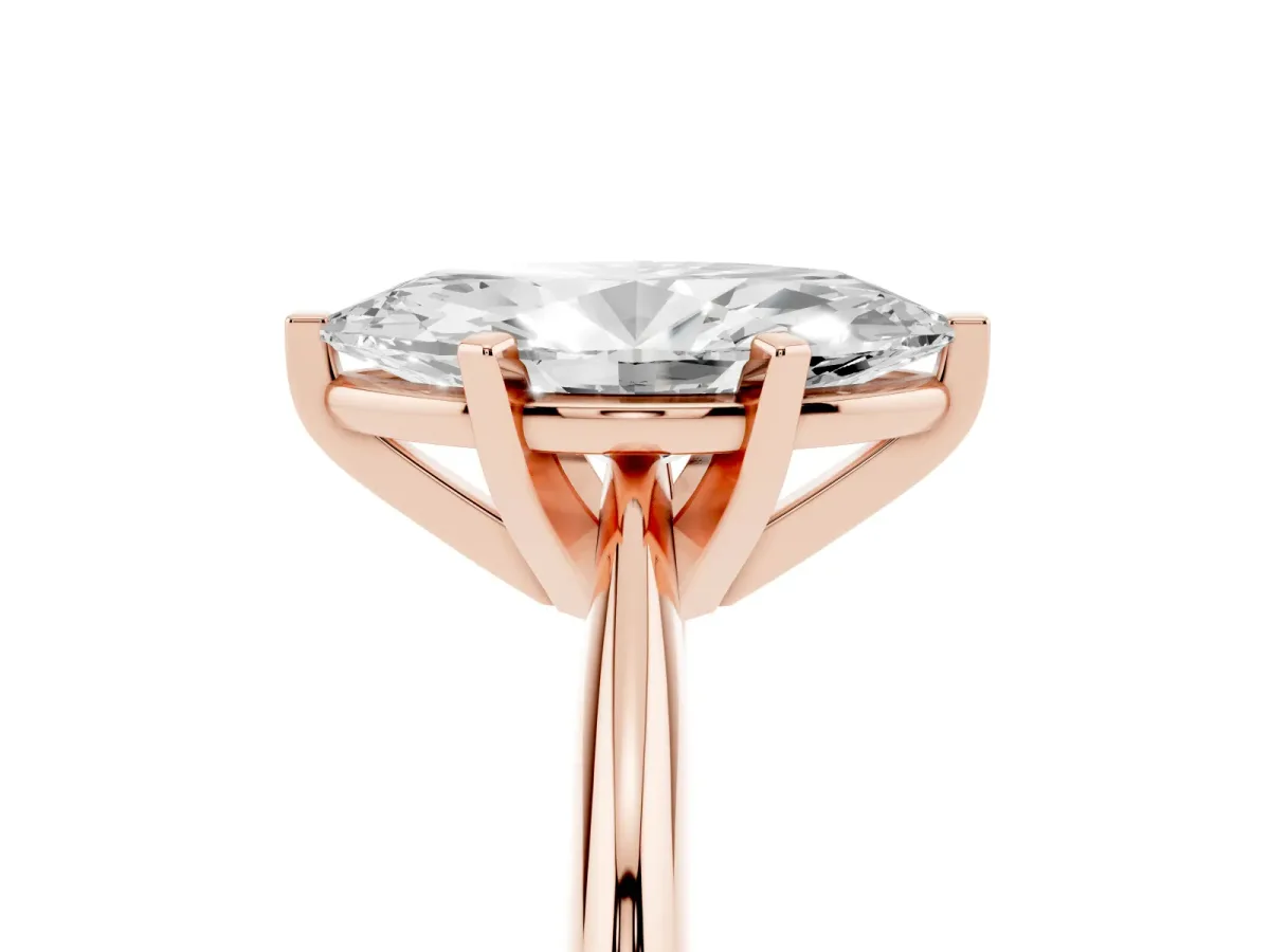 Marquise Cut Cut Solitaire Ring with Four-Prong Setting on a Classic Band Rose gold