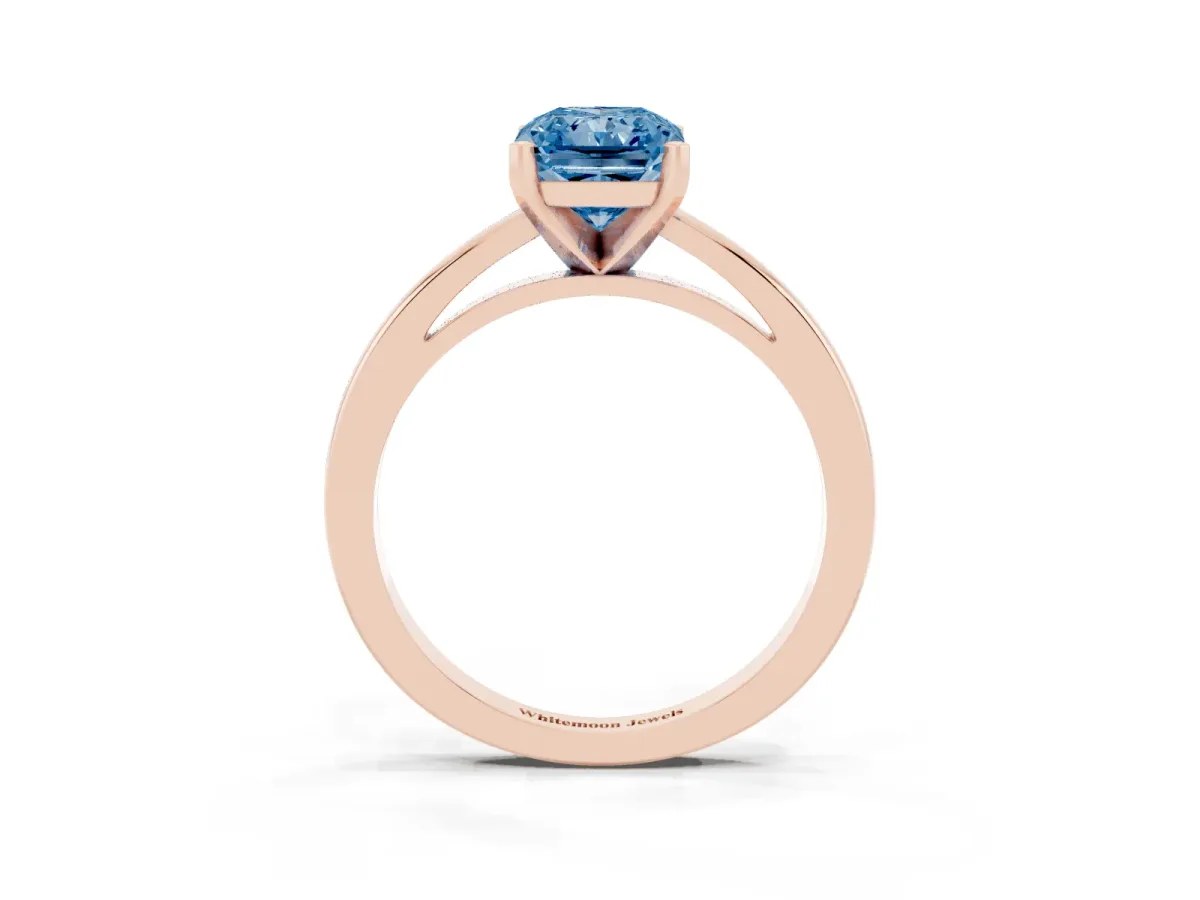 Fancy Blue Radiant Cut Solitaire Diamond Engagement Ring with Four-Prong Setting on a Classic Band Rose gold
