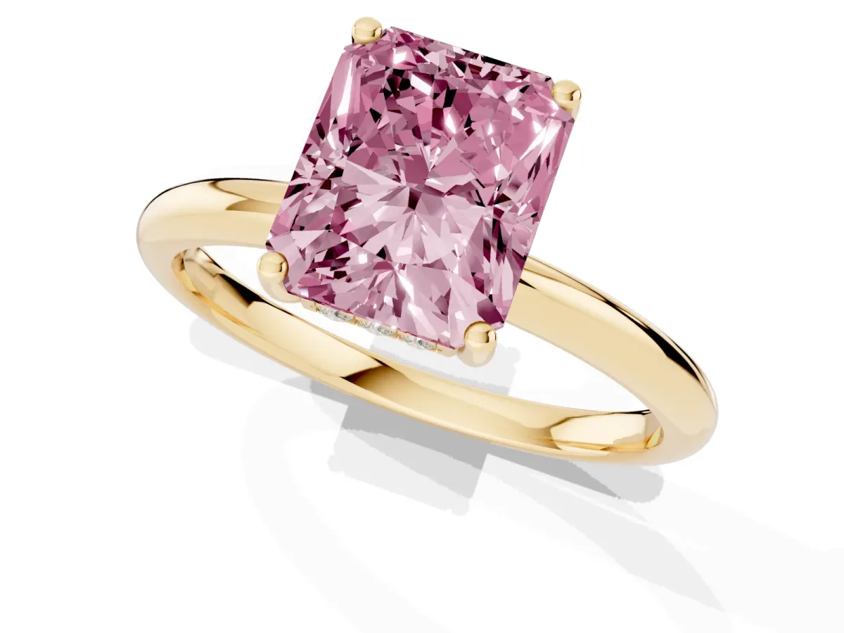 Fancy Pink Radiant Cut Cut Solitaire Engagement Ring with Four-Prong Setting and Classic Band Yellow gold
