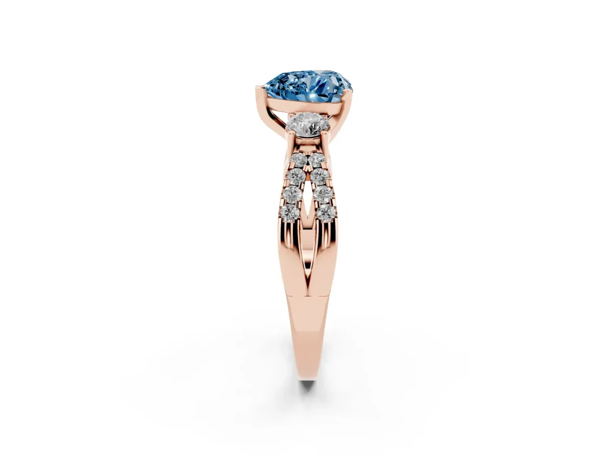 Fancy Blue Heart Cut Diamond Three-Stone Ring with Pavé Split Shank and Four-Prong Setting Rose gold