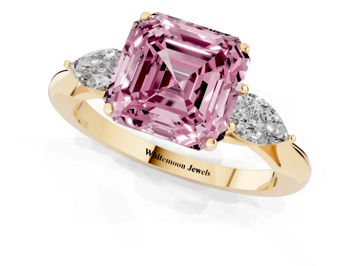 Fancy Pink Three-Stone Asscher Cut Brilliant Diamond Solitaire Ring with Tapered Band and Four-Prong Setting Yellow gold