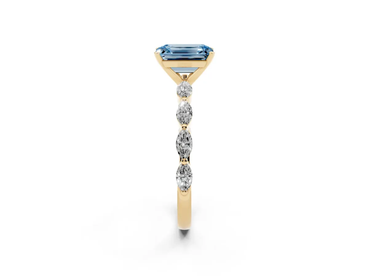 Fancy Blue Emerald Cut Diamond Ring with Marquise Side Stones and Prong Setting Yellow gold
