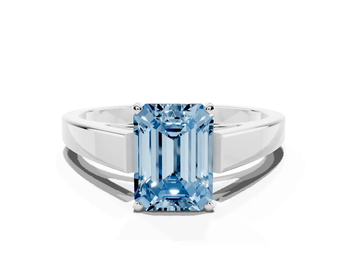 Fancy Blue Emerald Cut Solitaire Engagement Ring with Four-Prong Setting and Tapered Band Silver