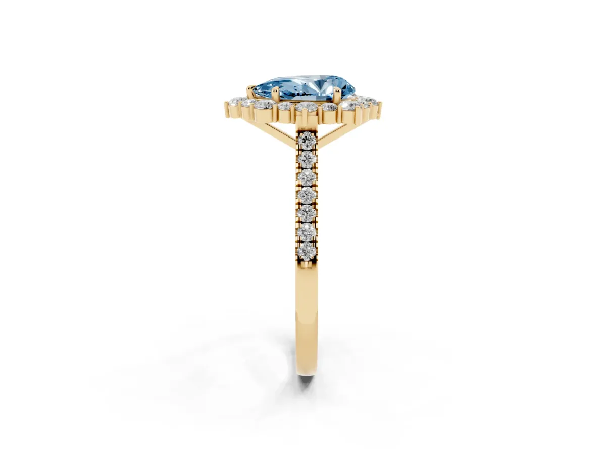 Fancy Blue Pear Cut Halo Diamond Ring with Pavé Band and Prong Setting Yellow gold