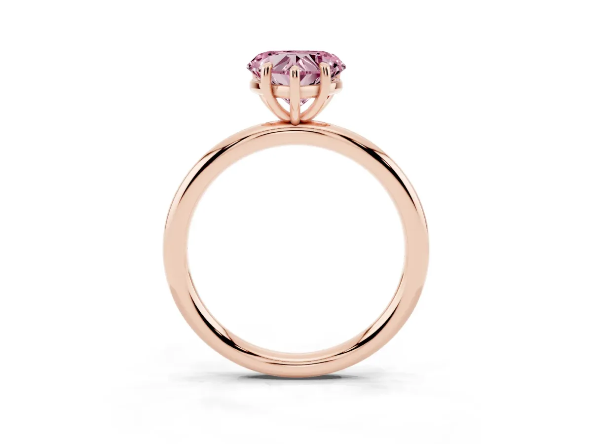 Fancy Pink Heart Cut Solitaire Diamond Ring with Four-Prong Setting on a Plain Band Rose gold