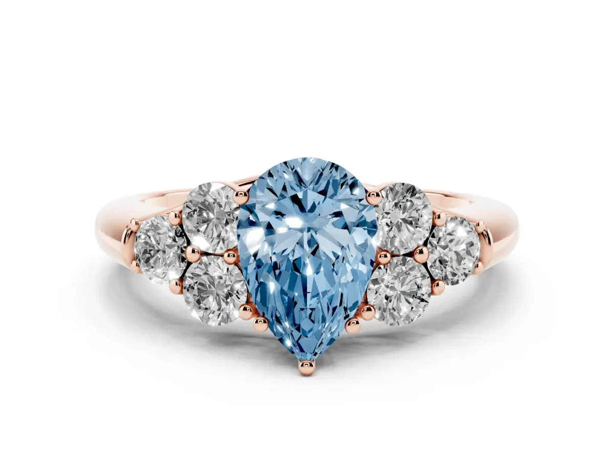 Fancy Blue Pear Cut Cut Diamond Cluster Ring with Round Accent Stones and Prong Setting on a Classic Band Rose gold