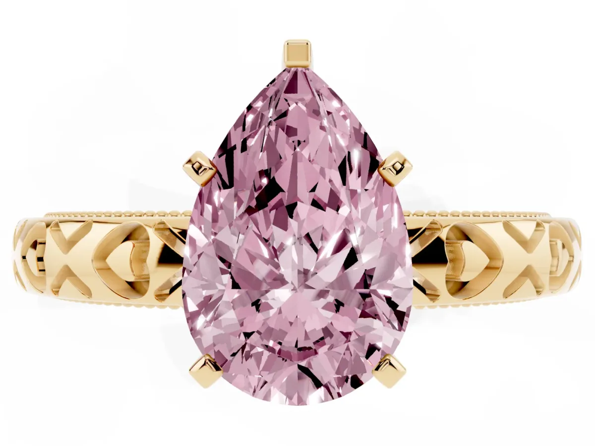 Fancy Pink Pear Cut Solitaire Diamond Engagement Ring with XO Engraved Band and Four-Prong Setting Yellow gold