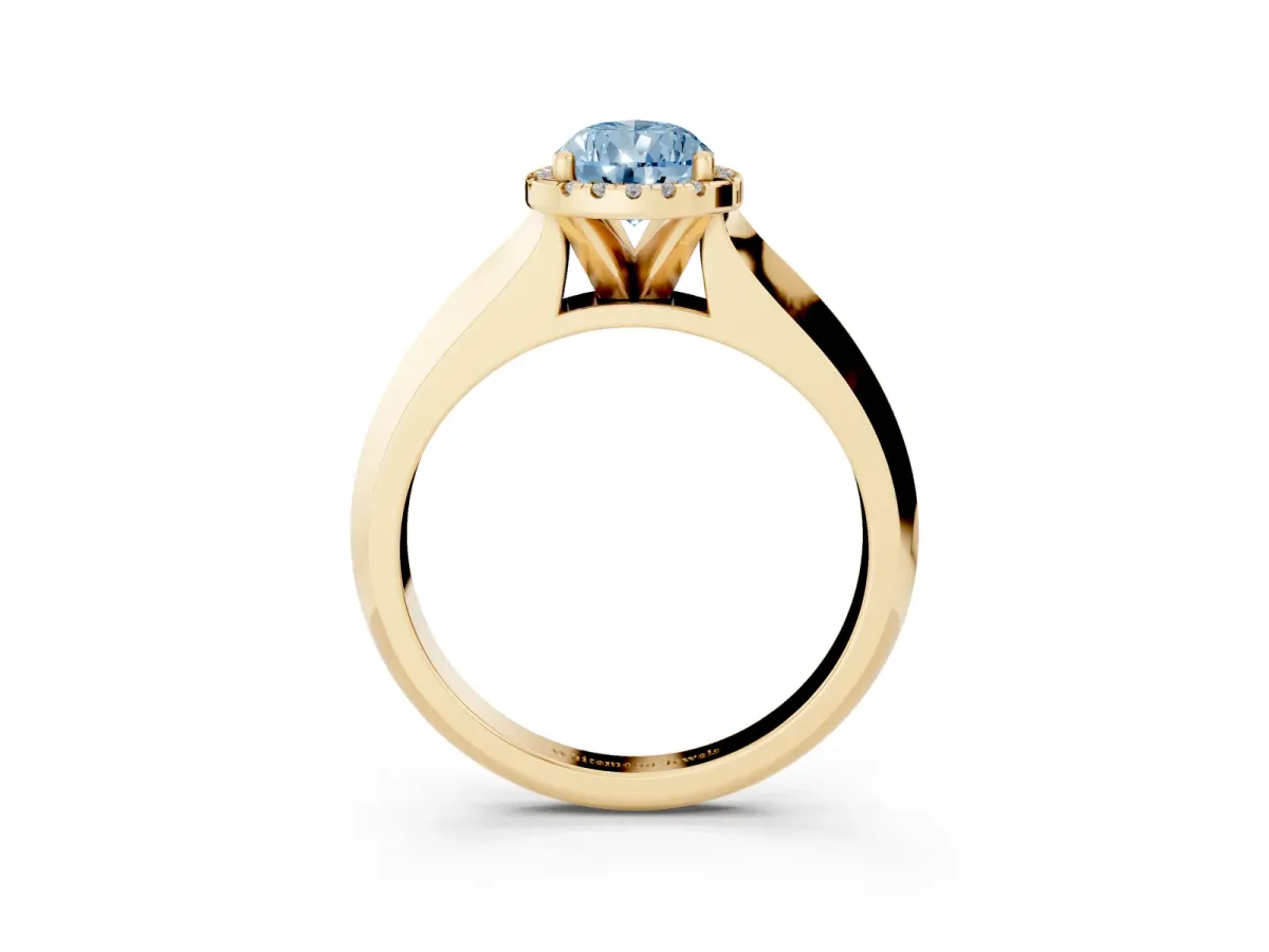 Fancy Blue Pear Cut Halo Diamond Ring with Cathedral Band and Four-Prong Setting Yellow gold