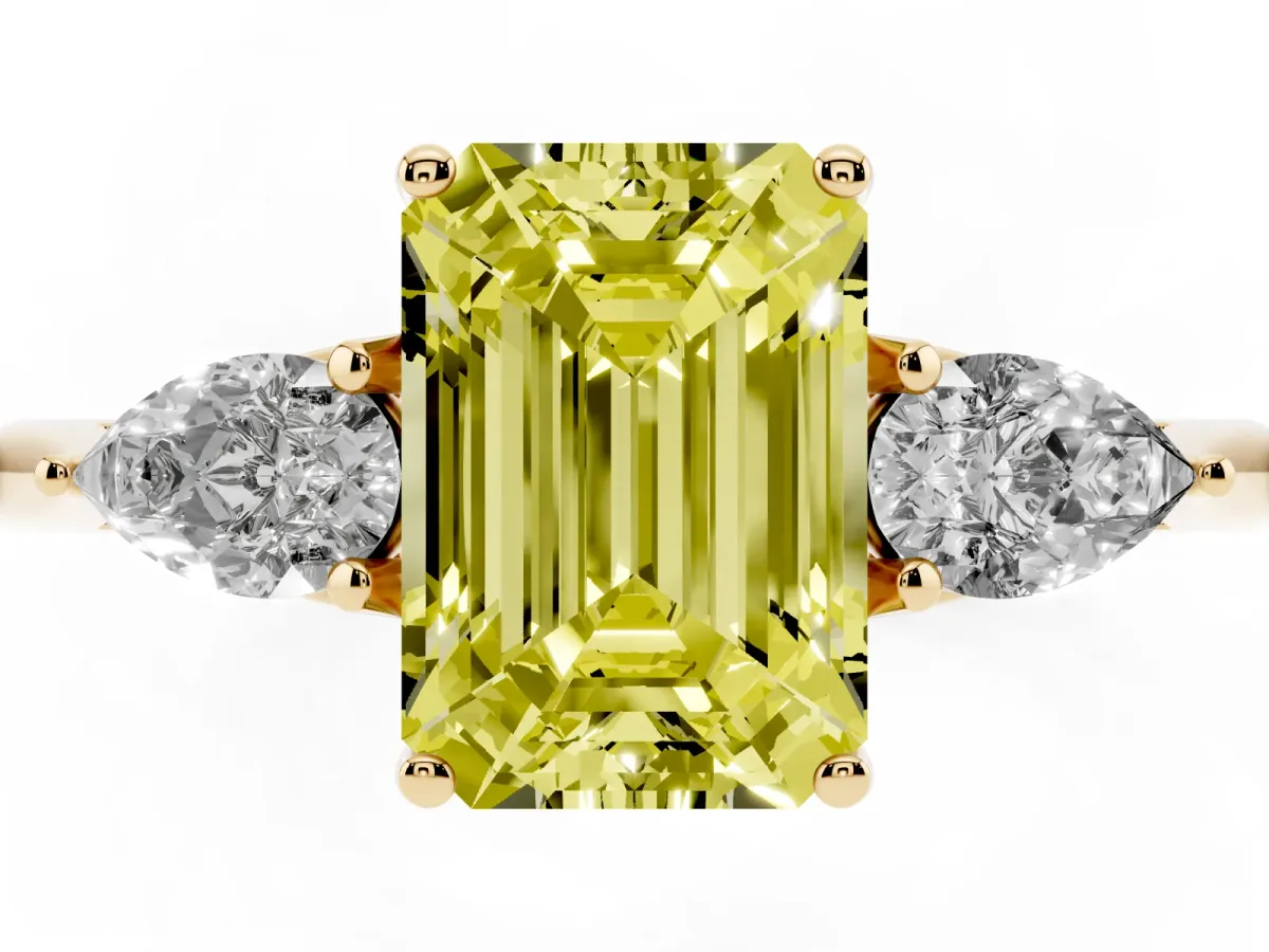 Fancy Yellow Three-Stone Emerald Cut Diamond Ring with Pear Side Stones in Four-Prong Setting Yellow gold