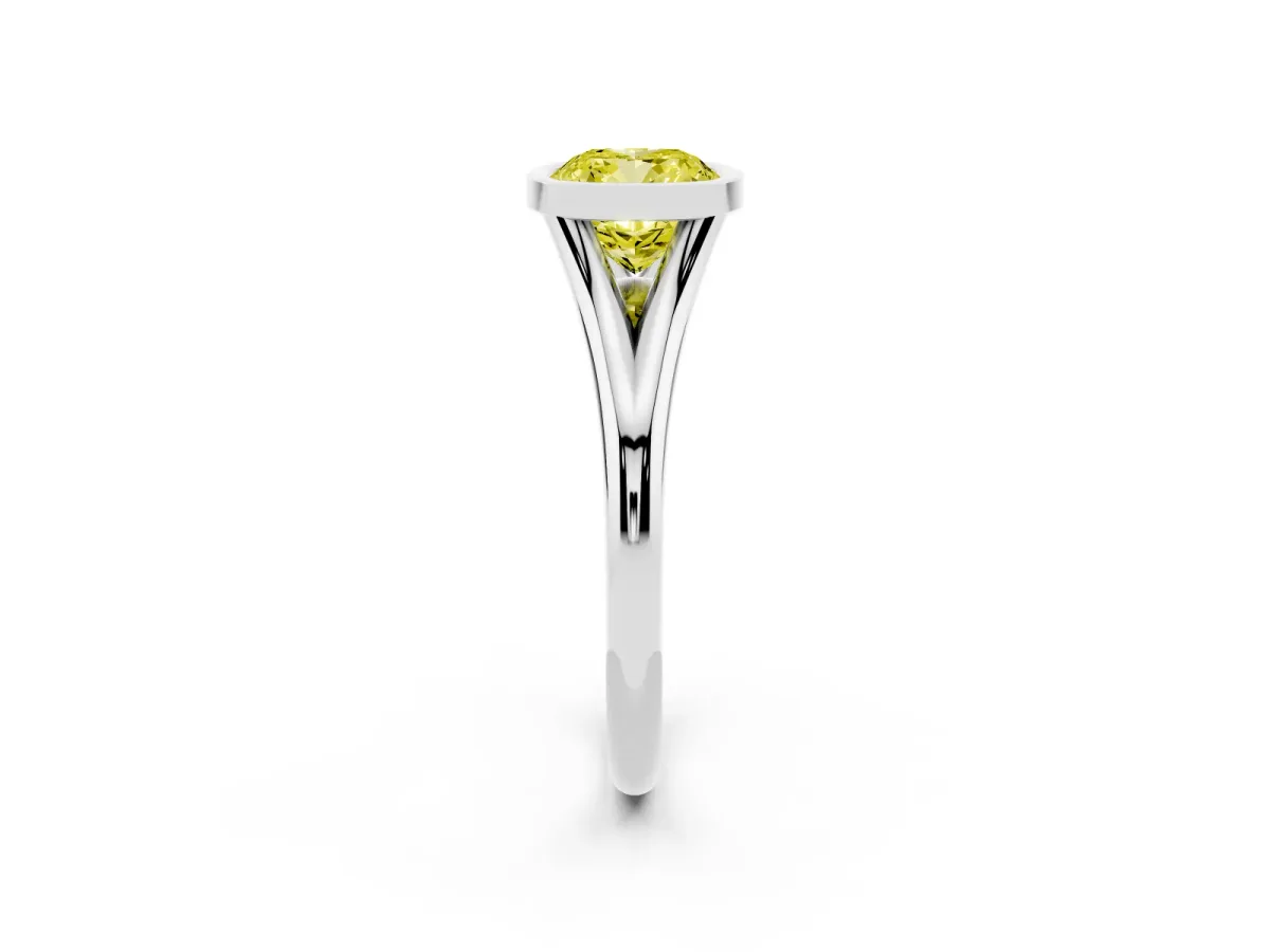 Fancy Yellow Bezel Set Cushion Cut Cut Solitaire Ring with Tapered Band White gold