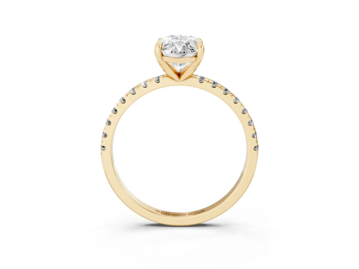 Marquise Cut Diamond Brilliant Solitaire Ring with Pavé Band and Four-Prong Setting Yellow gold