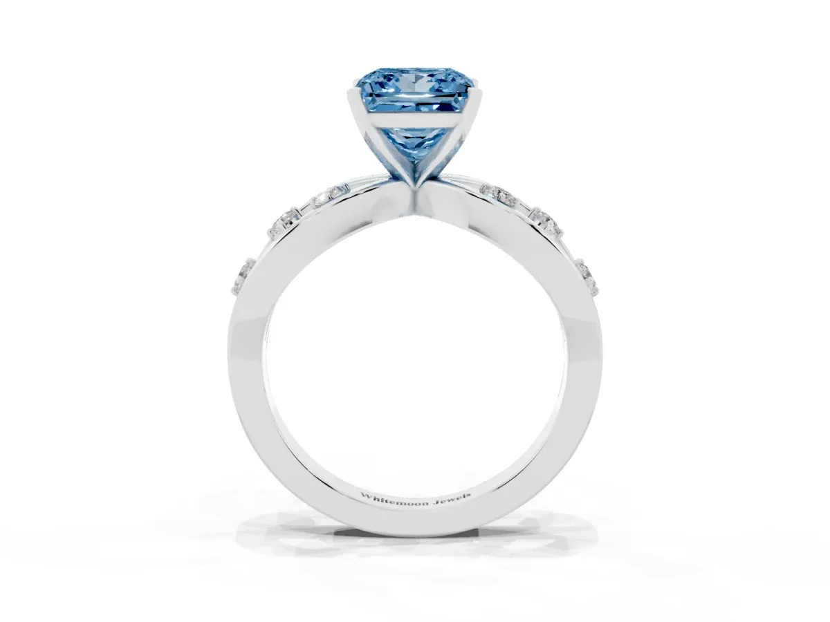 Fancy Blue Princess Cut Cut Solitaire Diamond with Side Stones on Criss-Cross Band and Four-Prong Setting White gold