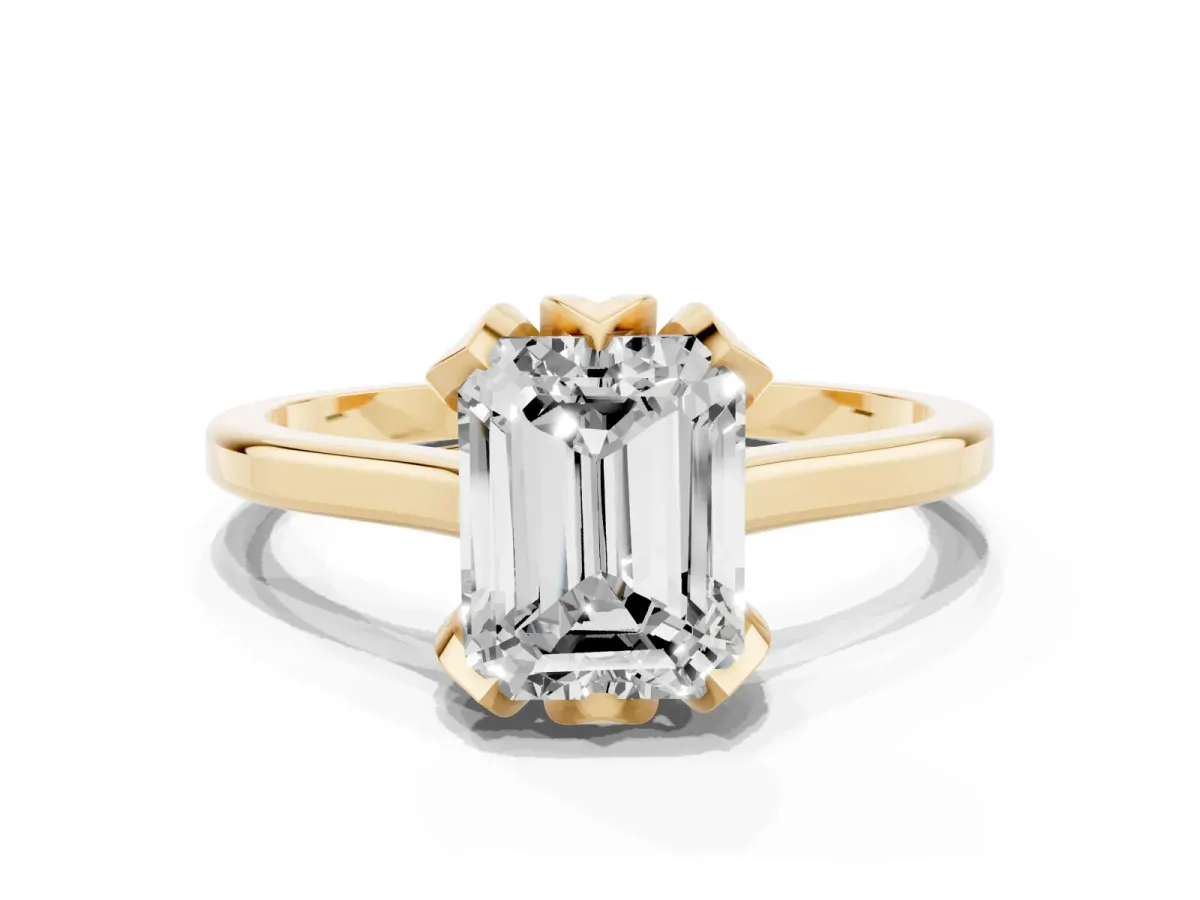 Emerald Cut Diamond Solitaire Ring with Flower Prong Setting and Classic Band Yellow gold