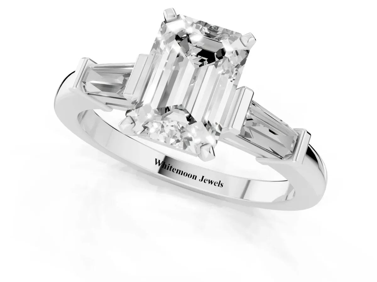 Emerald Cut Cut Diamond Solitaire Ring with Tapered Baguette Accents and Four-Prong Setting Silver