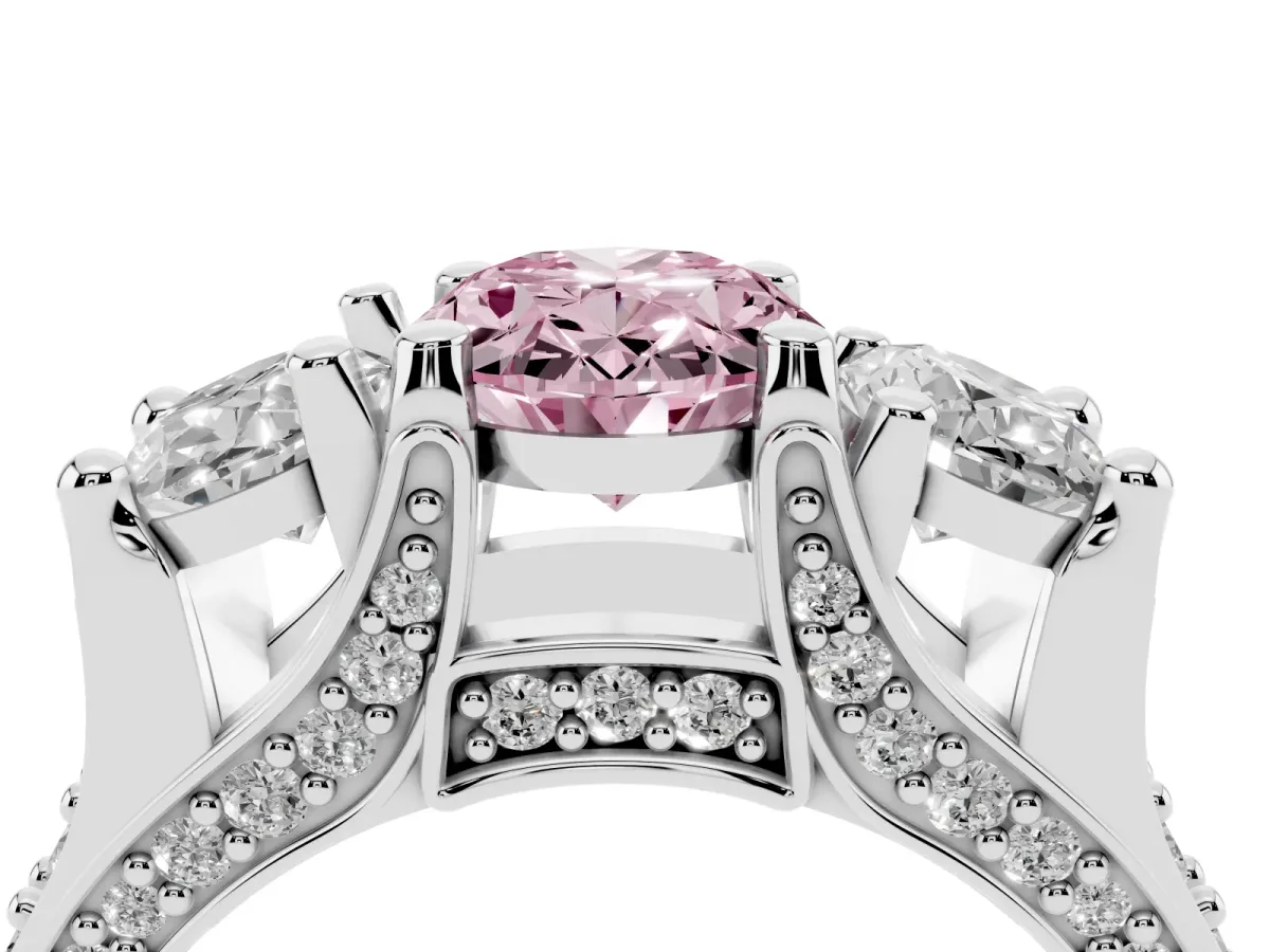 Fancy Pink Oval Cut Diamond Three-Stone Ring with Channel Set Band and Four-Prong Setting Silver