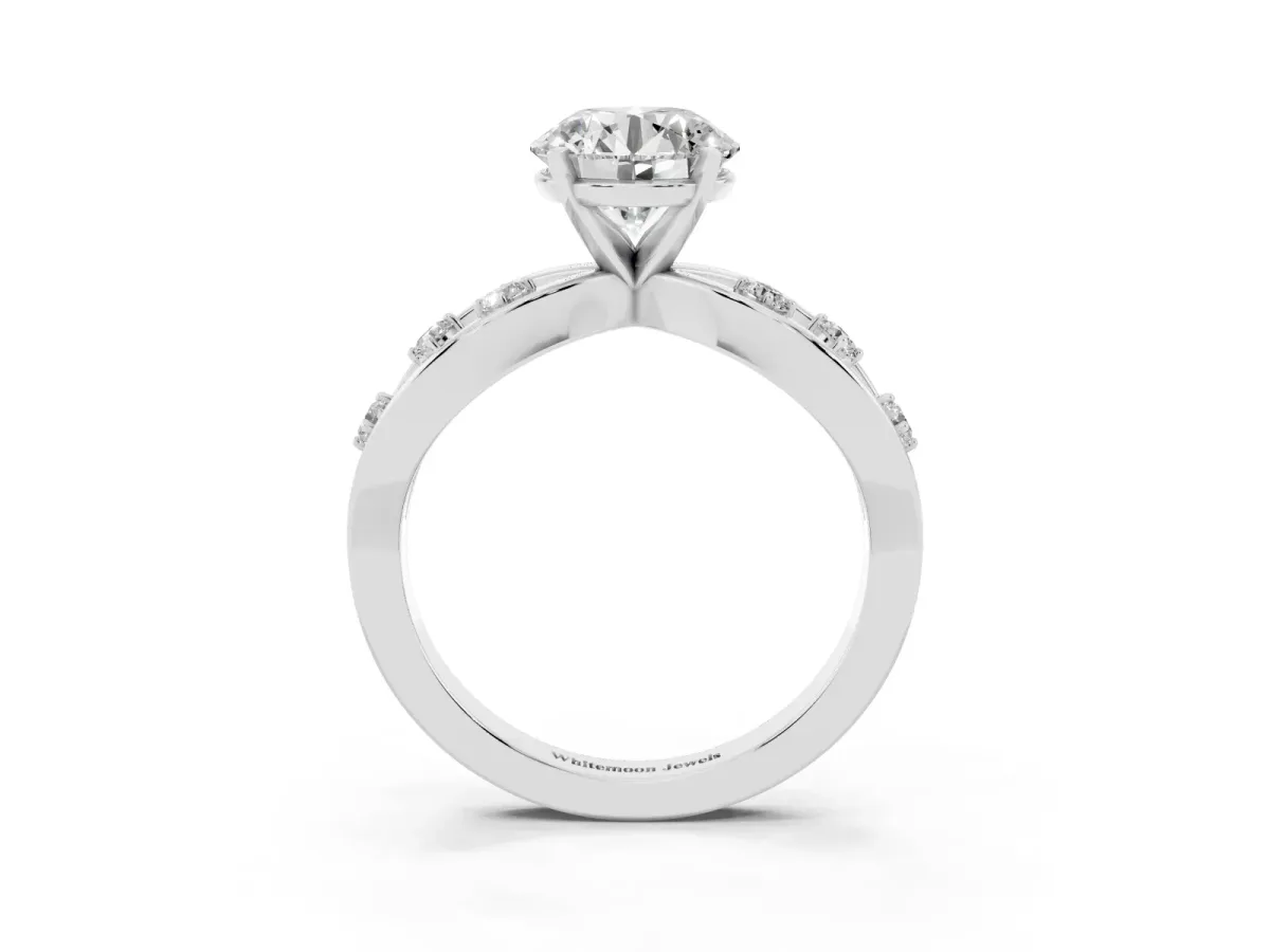 Round Cut Cut Solitaire Diamond with Side Stones on Criss-Cross Band and Four-Prong Setting Silver