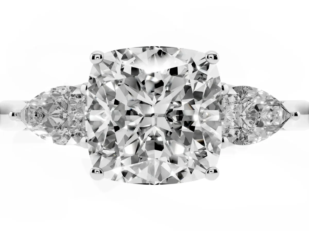 Cushion Cut Diamond Three-Stone Ring with Pear Side Stones and Prong Setting Platinum