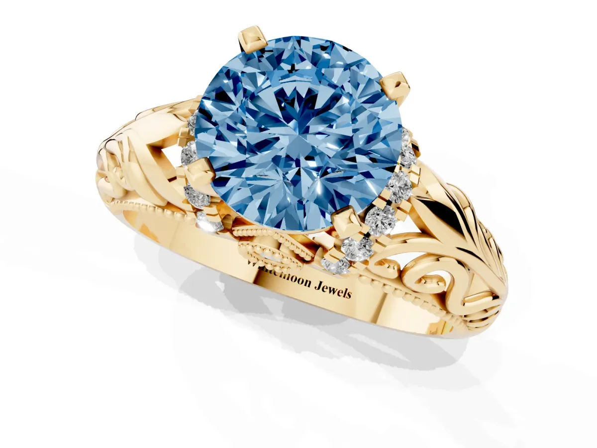 Fancy Blue Round Cut Solitaire Filigree Engagement Ring with Halo and Prong Setting Yellow gold