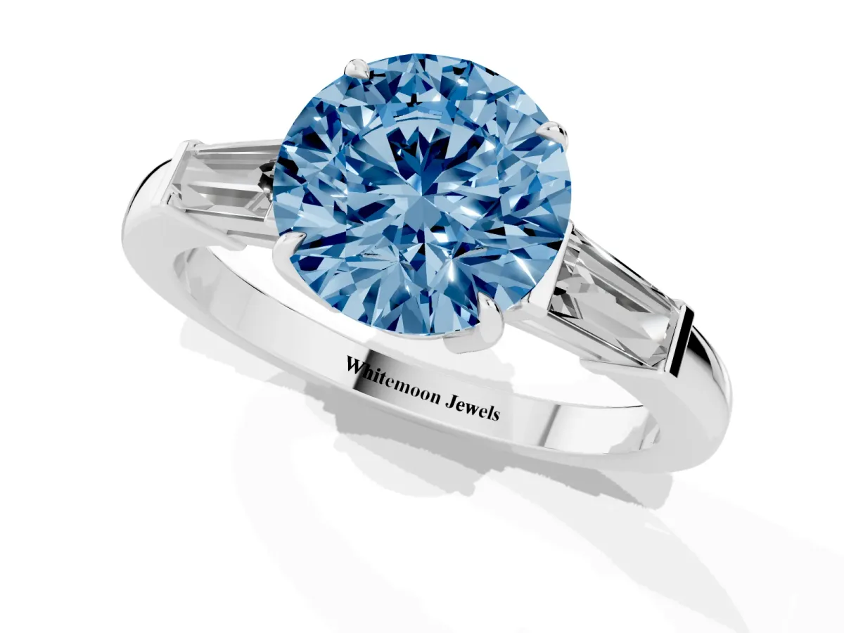 Fancy Blue Round Cut Diamond Three-Stone Ring with Tapered Baguette Side Stones and Prong Setting Silver