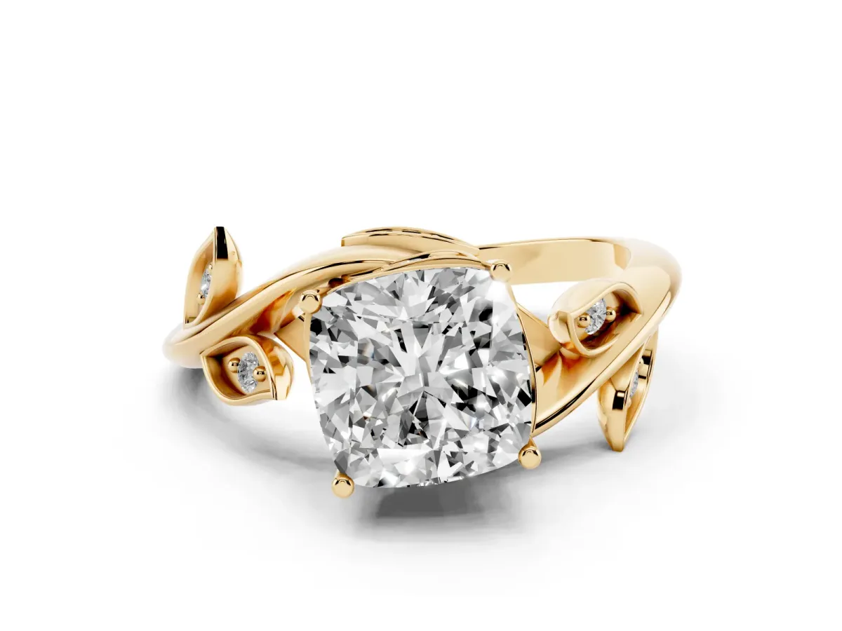 Cushion Cut Solitaire Twist Engagement Ring with Leaf Accents and Prong Setting Yellow gold